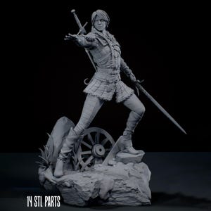 May include: A grey 3D printed figurine of a warrior standing on a rocky base with a wagon wheel. The figure wears textured armour, holds a sword in one hand, and has another sword strapped to their back. The text 14 STL PARTS is visible.