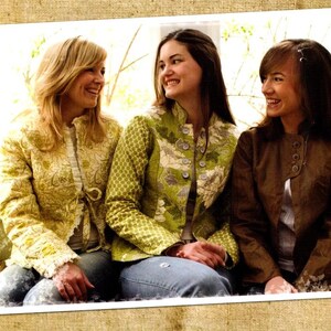 May include: Three jackets from the Favorite Things pattern designs V029 The Mandarin Jacket collection. One jacket is yellow with a floral print, one is green with a geometric and floral pattern, and one is solid brown. All feature a mandarin collar.