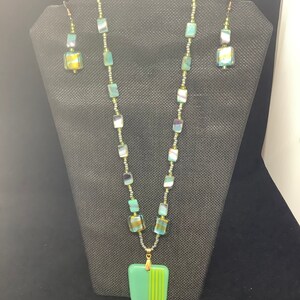 Teal and gold glass pendant necklace 28 inches long with matching earrings dangle 2 1/2 inches longe