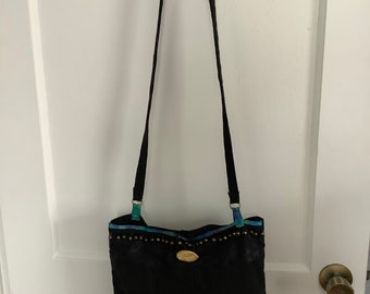 Purse, “Fish on the go”, in black, orange and blue