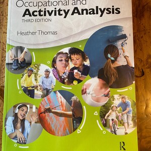 May include: A softcover textbook titled Occupational and Activity Analysis Third Edition by Heather Thomas. The white and lime green cover features multiple circular photo insets showing people engaged in various daily activities and tasks.