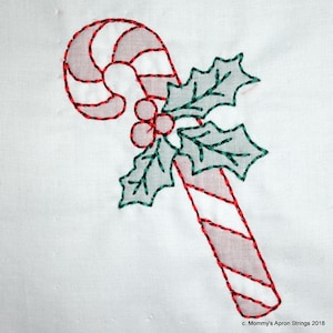 May include: Red and white candy cane with green holly leaves and red berries. The candy cane is outlined in red thread and the holly leaves are outlined in green thread.