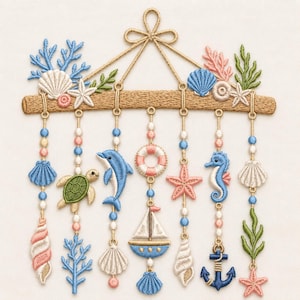 May include: A wall hanging featuring embroidered nautical motifs suspended from a horizontal tan bar. The design includes a dolphin, sea turtle, sailboat, life preserver, anchor, starfish, seashells, and seaweed in shades of blue, pink, and green.