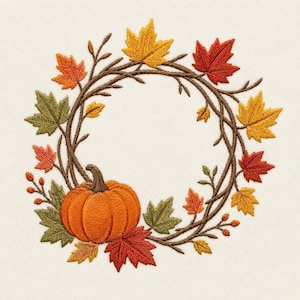 May include: An embroidery design featuring a circular wreath made of brown intertwined branches, decorated with various autumn-colored maple leaves in shades of red, orange, yellow, and green, and a single orange pumpkin at the bottom left.