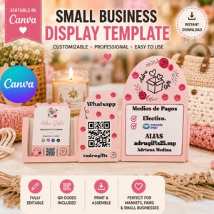 Puede incluir: Un expositor de negocios rosa de tres paneles con detalles florales, un código QR para WhatsApp e información de pago para Adru Gifts. El soporte incluye una ranura para tarjetas de visita y texto detallando métodos de pago como Efectivo.