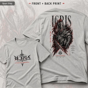 May include: A sport grey t-shirt featuring a front and back print. The front displays a sword emblem with Korean text and the word BLOOD-RED COMMANDER. The back features a detailed illustration of a knight in armor with red accents and text.