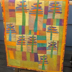 Sunset Pines Art Quilt: Silk Accents, Machine Pieced, Free-Motion Quilted
