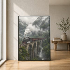May include: A framed vertical wall art print depicting a black steam locomotive pulling red passenger carriages across a stone viaduct. Thick white smoke billows from the engine into a misty, mountainous landscape with green trees and a waterfall.
