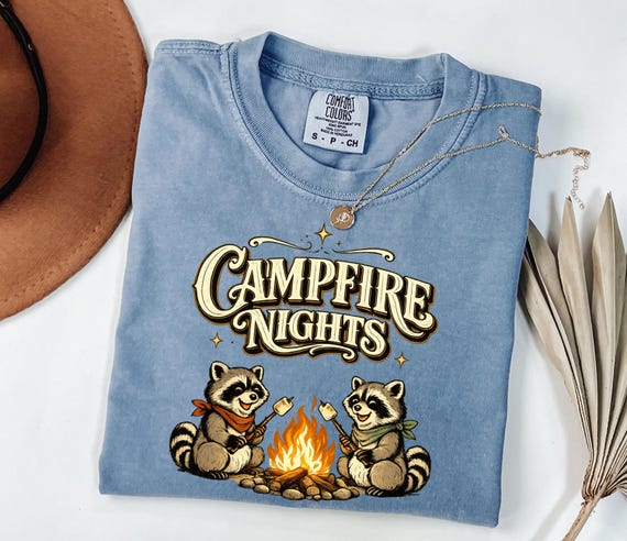 Campfire Nights Raccoon Graphic Tee, Cute Camping Shirt, Nature Lover Gift, Woodland Animal Apparel, Retro Smores Roasting Raccoon