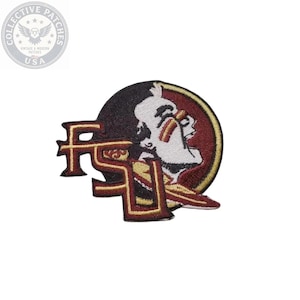 May include: An embroidered patch featuring the Florida State University logo with the letters FSU in garnet and gold, overlaid on a circular background depicting a profile of a person with face paint, rendered in garnet, gold, black, and white thread.