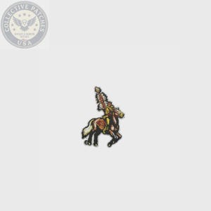 May include: An embroidered patch featuring a figure riding a horse, wearing a tall feathered headdress and holding a spear. The horse has a red saddle blanket with the letters FSU in gold. The design uses colours of gold, red, white, and black.