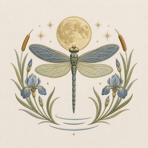 May include: An embroidery design featuring a central blue dragonfly with translucent wings positioned below a golden full moon. The dragonfly is flanked by two blue iris flowers, green foliage, and brown cattails, with small stars surrounding the moon.