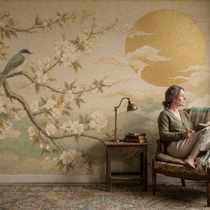 May include: A wall mural featuring a large golden sun, white cherry blossoms on dark branches, and a small bird perched on a limb. The scene is painted in soft muted tones of beige, green, and gold, creating a serene atmosphere on the wall.