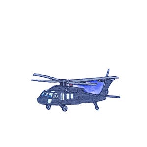 May include: An embroidered patch featuring a dark blue military helicopter with a detailed cockpit, visible windows, a main rotor system, and a tail rotor. The design uses textured stitching to define the aircraft shape and structural features.