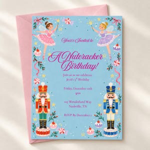May include: A light blue birthday invitation card featuring two fairies in pink and purple dresses, two nutcracker soldiers in red and blue uniforms, and candy illustrations. The text reads: You're Invited to A Nutcracker Birthday! Join us as we celebrate Jessi's 5th Birthday, Friday, December 11th, 3pm, 123 Wonderland Way, Nashville, TN, RSVP By December 1.