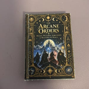 May include: A small rectangular book titled The Arcane Orders: Mages, Wizards, Sorcerers & Masters of Magic. The cover features a dark blue night sky, a large full moon, a castle, and four cloaked figures holding staffs with glowing light.