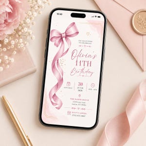 May include: A smartphone displaying a digital birthday invitation with a pink ribbon graphic. The text reads: You're invited to celebrate Olivia's 11th Birthday, Saturday 30 June 2026, 1pm-4pm, The Bloom House, 452 Peony Lane, Austin, TX 78704, RSVP to Sophie (555) 654-0987.