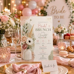 Könnte beinhalten: Eine rechteckige Einladungskarte für einen Braut-Brunch mit einer Aquarellillustration einer weißen Vase mit Trockenblumen, Pampasgras und Rosen. Der Text enthält 'You're invited to a Bridal Brunch honoring Charlotte' sowie Veranstaltungsdetails.