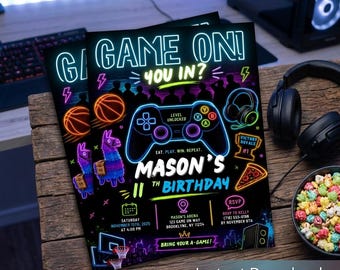 May include: A black birthday invitation flyer with neon-style graphics including a game controller, a llama, a basketball, a pizza slice, and a trophy. The text reads GAME ON! YOU IN? MASON'S 11TH BIRTHDAY, with event details for Saturday, November 15th, 2025.