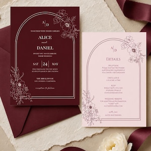 May include: A deep burgundy wedding invitation and a light pink details card, both featuring an arched frame and white floral line art. The text includes names Alice and Daniel, the date May 24, and event details. The cards are rectangular in shape.
