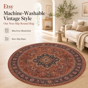 May include: A round rug featuring a dark central medallion and intricate floral patterns in shades of rust, deep red, and charcoal gray. The rug has a wide, dark border with repeating floral motifs and a non-slip base, designed to be machine-washable.