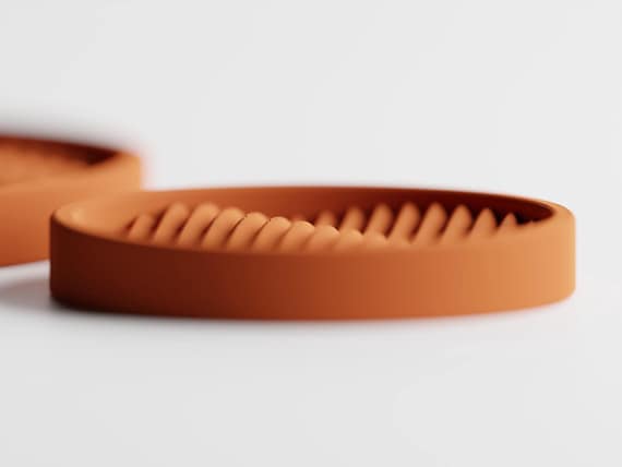 Watersong Tray Set, side close-up of the small Ripple Haven key tray with a smooth raised rim