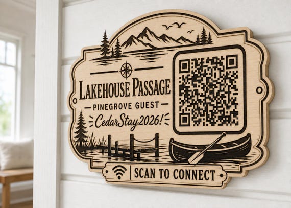 Lakehouse Passage WiFi Sign engraved birch sign mounted on a realistic neutral interior wall from a close side angle in natural birch and dark engraving, showing the QR code and guest network details.