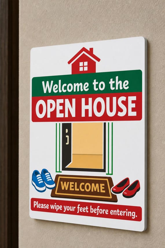 StepInside multicolor open-house wipe-feet sign mounted on a neutral wall from a close side angle.