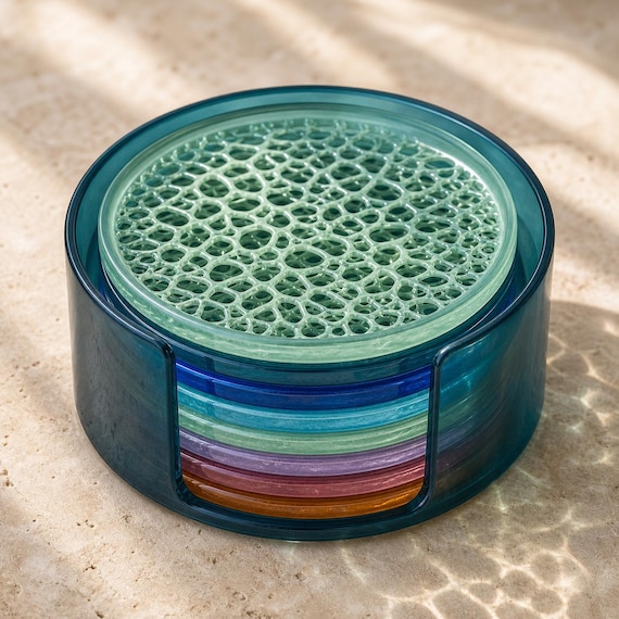 Prismtide Coaster Set, high angle close-up showing the intricate cellular lattice on the top seafoam coaster