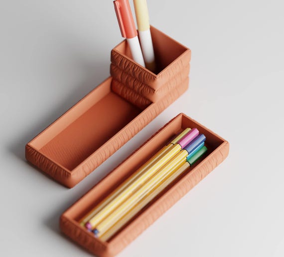 High-angle close-up of both finished StudioSwell Organizer Set desk organizer pieces