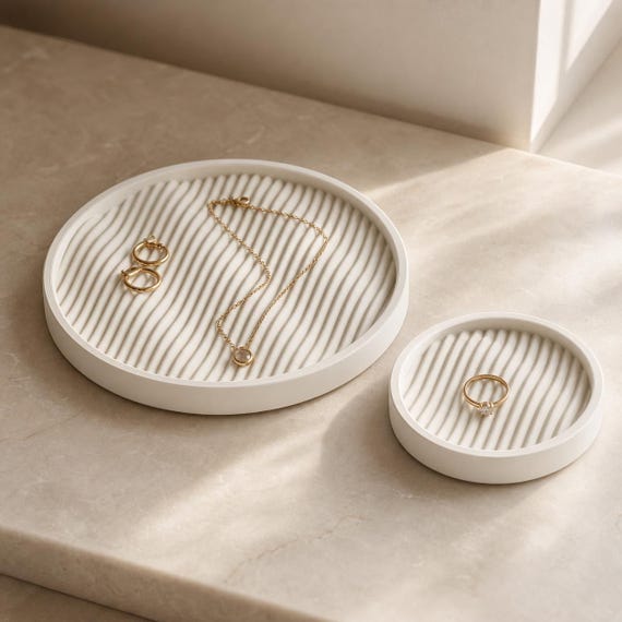 Watersong Tray Set, ivory White Ripple Haven catchall trays holding rings and delicate jewelry on a vanity