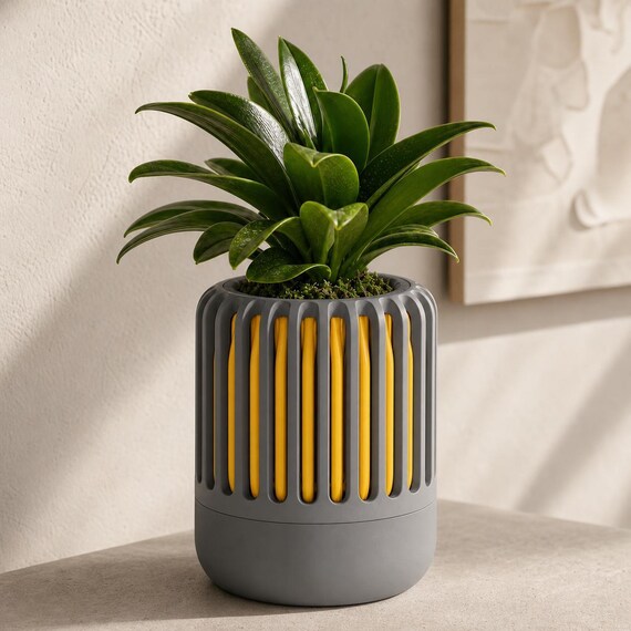 BreezeCage Orchid Pot, close-up of the Airloom ventilated planter in Dark Grey and Sunflower Yellow Solar Slate colors