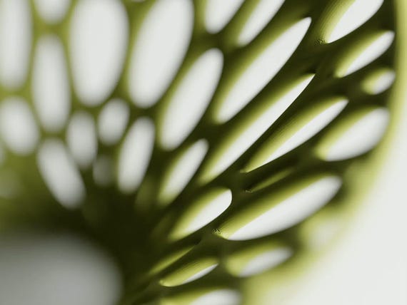 Macro detail of the Airbloom Pedestal Bowl bowl's airy organic lattice