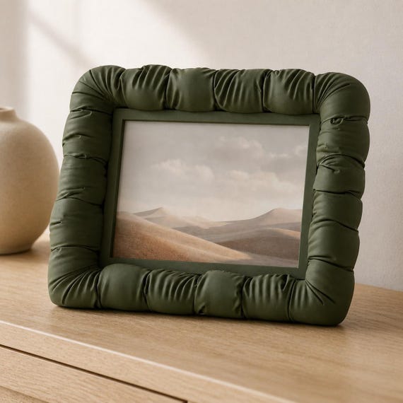 Three-quarter close-up of the Cloudrim Photo Frame tabletop picture frame in Dark Green