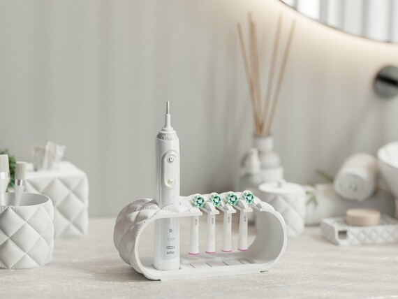 Close-up of the Cottonstay Bath Collection open family toothbrush dock from a front angle