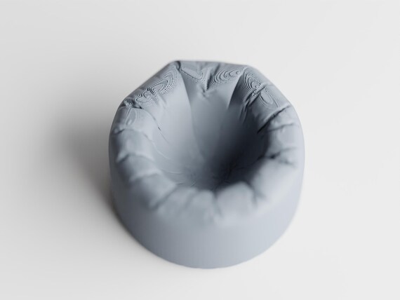Empty Morningswell Egg Cup egg cup showing its recessed center and rounded rim