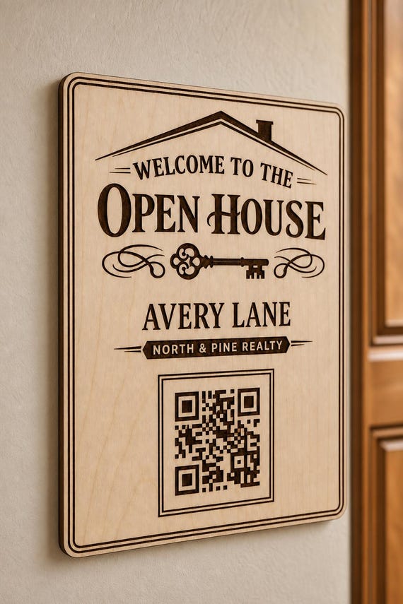 Heritage Key engraved birch agent sign mounted on a warm wall from a close side angle with Avery Lane and a finished sample QR code.