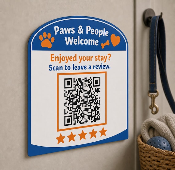 Pawprint Welcome multicolor pet-friendly review sign mounted on a neutral wall from a close side angle with a finished sample QR code.