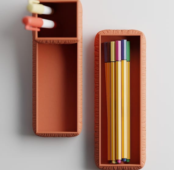 Top close-up of the StudioSwell Organizer Set pen holder and long pencil tray in Terracotta
