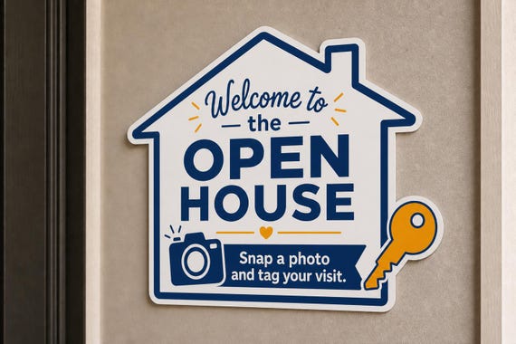 SnapKey multicolor landscape open-house photo sign mounted on a neutral wall from a close side angle.