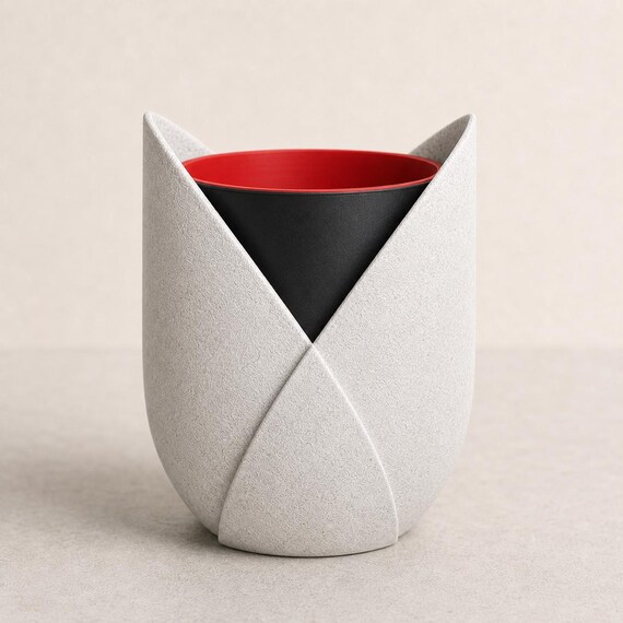 Close-up of the LayerMoon Planter planter in Marble White, Black, and Red