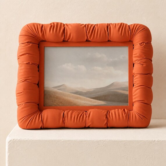Straight-on close-up of the Cloudrim Photo Frame soft curve photo frame in Terracotta