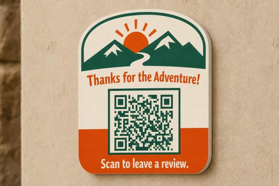 SummitGlow multicolor mountain review sign mounted on a warm neutral wall from a close side angle with a finished sample QR code.