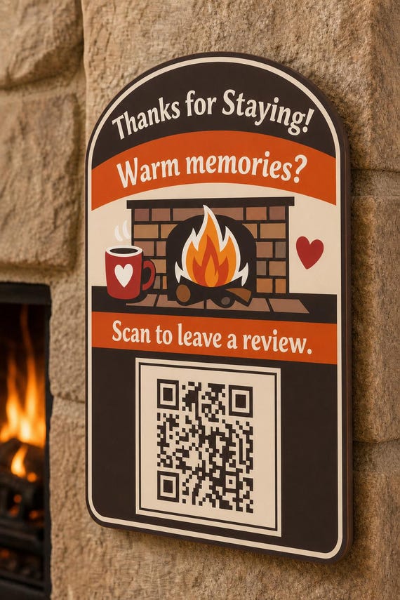 EmberHearth multicolor fireside review sign mounted on a warm wall from a close side angle with a finished sample QR code.