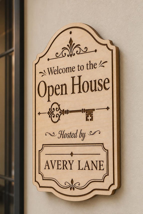 VintageKey engraved birch hosted open-house sign mounted on a warm wall from a close side angle with Avery Lane.
