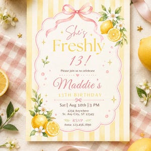 May include: A rectangular birthday invitation card with a yellow and white vertical striped background. The card features a pink scalloped border, a pink ribbon bow, and watercolor lemon illustrations. Text reads: She's Freshly 13! Maddie's 13th Birthday.