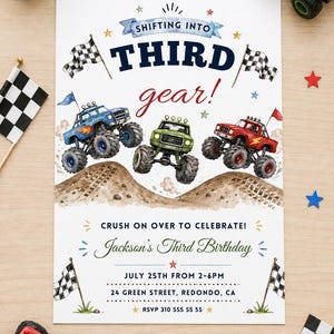 May include: A birthday invitation card featuring three monster trucks in blue, green, and red driving on dirt mounds. The text reads: SHIFTING INTO THIRD gear! CRUSH ON OVER TO CELEBRATE! Jackson's Third Birthday, JULY 25TH FROM 2-6PM, 24 GREEN STREET, REDONDO, CA, RSVP 310 555 55 55.