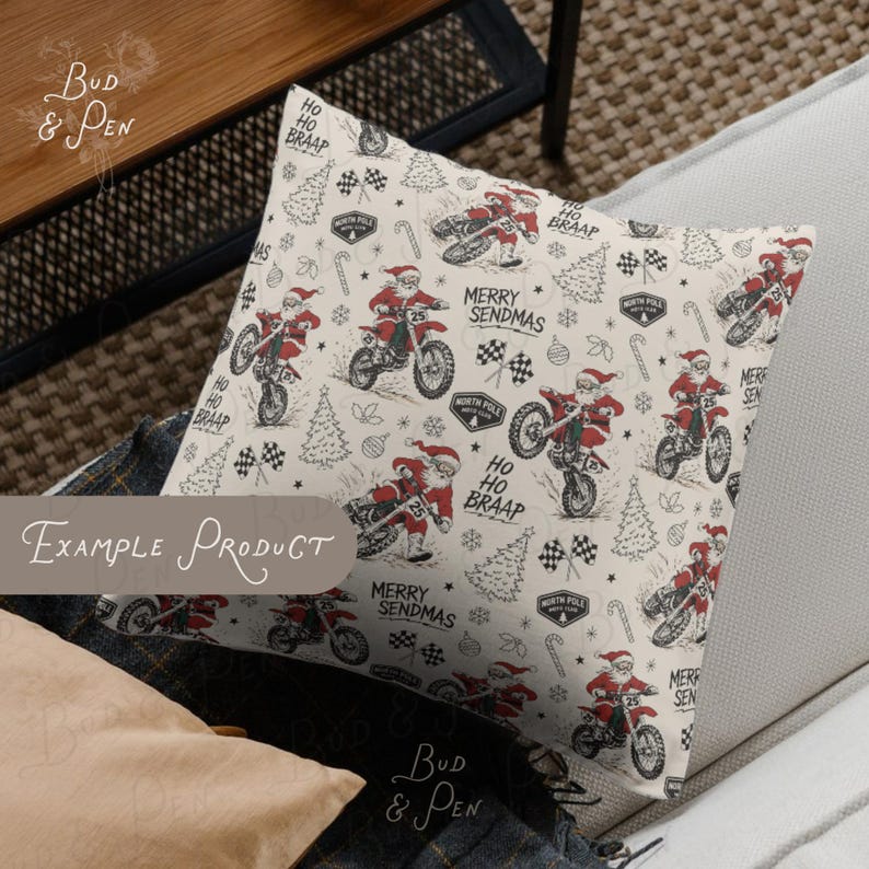 May include: A square throw pillow featuring an off-white background with a repeating pattern of Santa Claus riding a dirt bike. The design includes text reading Merry Sendmas, Ho Ho Braap, and North Pole Moto Club, alongside pine trees, checkered flags, and candy canes.