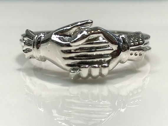 Holding hands online ring meaning