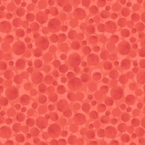 May include: A fabric pattern featuring a repeating design of solid, circular shapes in varying shades of coral and salmon pink. The circles are layered and overlapping across the entire surface, creating a dense, textured, and monochromatic visual effect.